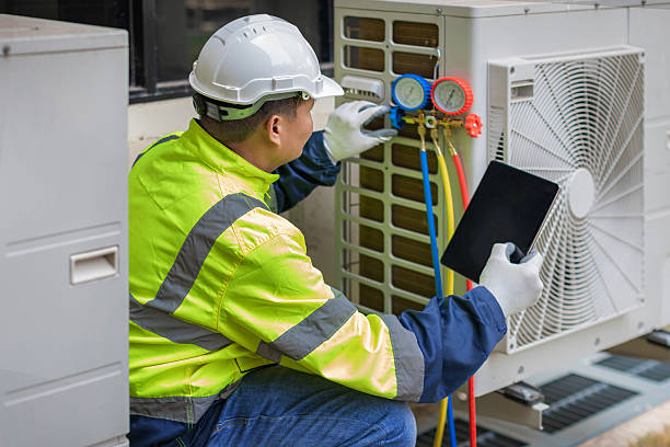 Professional Air Duct Cleaning technician working in Cato, NY